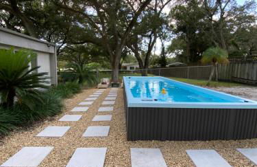 Reel relaxing across from River in Huge 24 foot Swim Spa - Photo 6