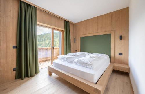 Ama Dolomiti - Residence - Photo 8