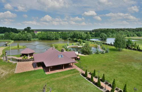 Dom nad stawem przy lesie - Foto 34