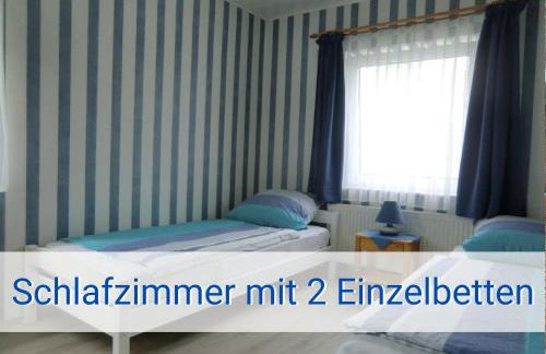 Böltser Hus Ferienwohnungen mit Strandkorb und Kamin 10 Gehminuten zum kurtaxefreien Sandstrand - Foto 68