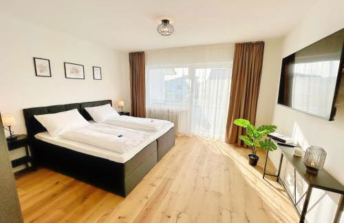 Basilisk Homes - in Grenzach-Wyhlen bei Basel - 4 x Moderne Fewos je 1bis2, 1bis4 oder 1bis6 Pers mit Küche und Balkon oder Terrasse - Parkplätze vorhanden - Foto 4