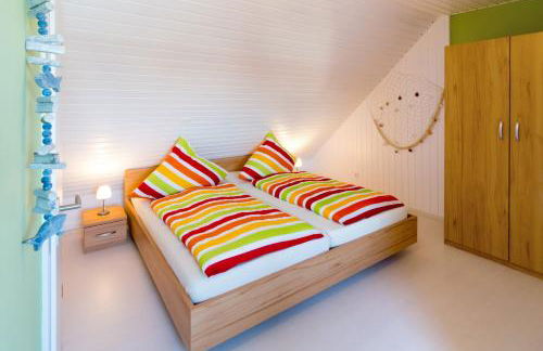 Ferienwohnung Sandfloh Norddeich - Foto 24