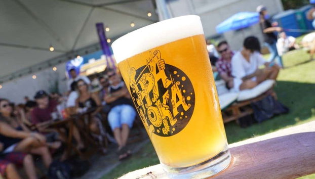 Tasting a glass of craft beer