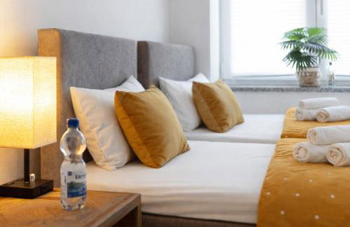 SONNENglück - Großes Apartment für 8 im Zentrum mit flexiblen Betten, Balkon & Parkplatz - Photo 12