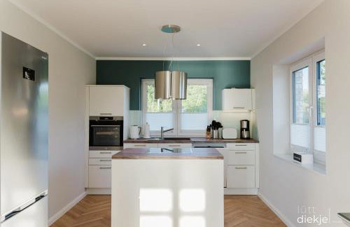 Lütt Diekje - Luxus-Haus mit Meerblick, Sauna & Kamin - Photo 7