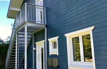 Gemütliche Wohnung mit Sonnenterrasse im blauen Holzhaus - Foto 14