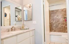 Poolside 2BR Condo with Balcony & Workspace - Photo 34