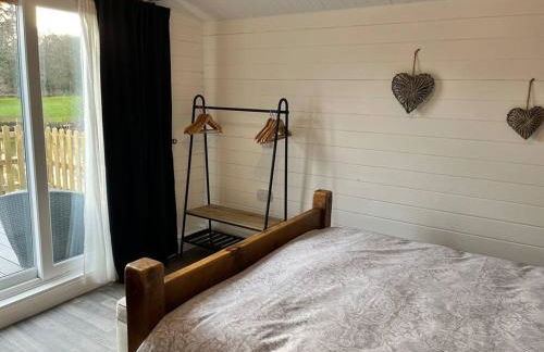 Blackbrook Lodge Cabin - Foto 8