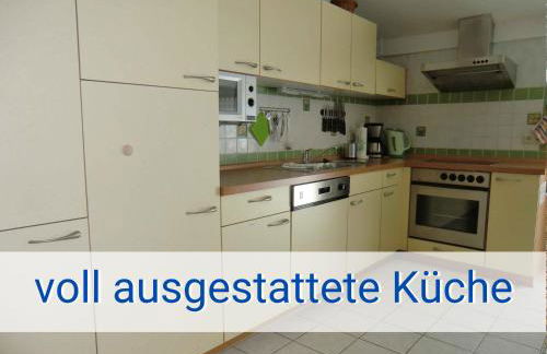 Böltser Hus Ferienwohnungen mit Strandkorb und Kamin 10 Gehminuten zum kurtaxefreien Sandstrand - Foto 11