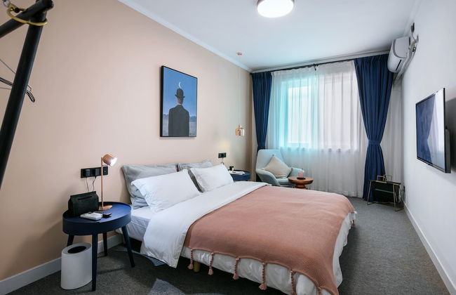 Zhigao West Lake Apartment Xifuju - Photo 4