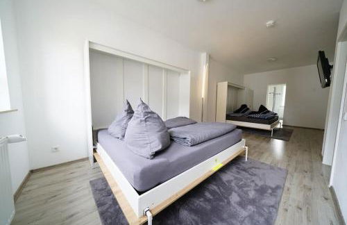 Schöne helle 50qm Suite mit großer Küche - Foto 16