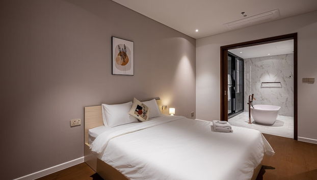 DongDong Apartment The Metropole - Foto 2, Habitación