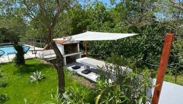 Wellness House Oliva with heated salt water Pool, Sauna & Jakuzzi - Foto 5, Garden, sunbed, Garden view