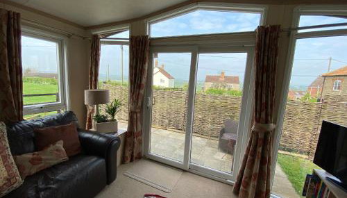 Rew Farm Country and Equestrian Accommodation - Sunset Lodge - Foto 5, Garden view