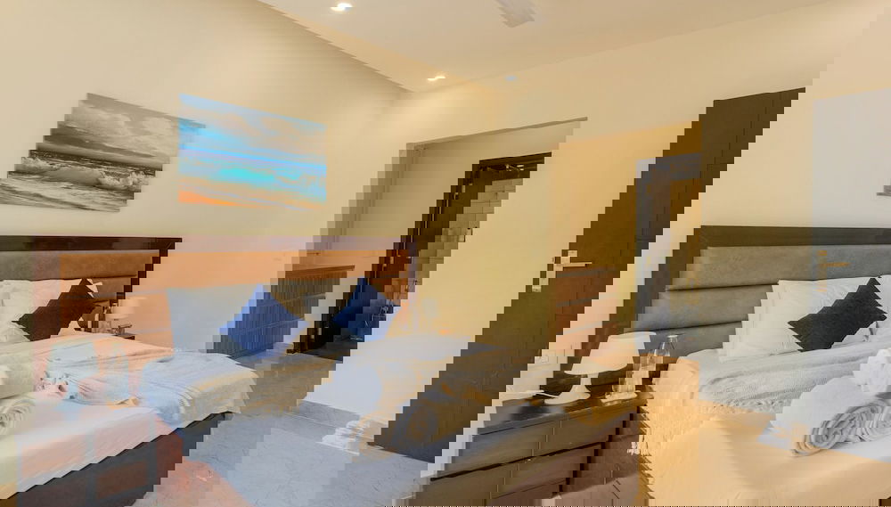 Alaya Stays Luxfort 1 BHK Apartment - Foto 1, Habitación