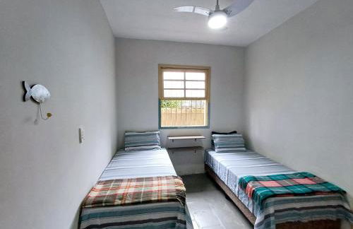 Casa Temporada Ubatuba perto da praia, check-in e out flexíveis com 5 vagas na garagem, wifi, churrasqueira - Foto 9