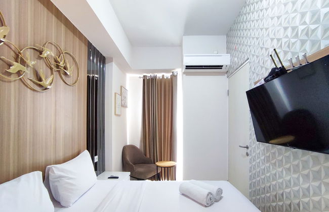 Fancy And Nice 1Br With Extra Room At Amartha View Apartment - Photo 4