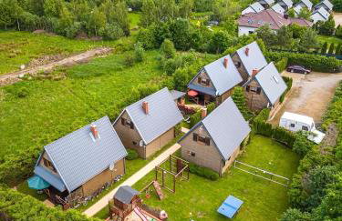 CAŁOROCZNE DOMKI NAD MORZEM I JEZIOREM - Foto 34