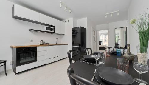 Spacious Apartment Dmowskiego by The River with Parking & Balcony by Noclegi Renters - Foto 4, minibar