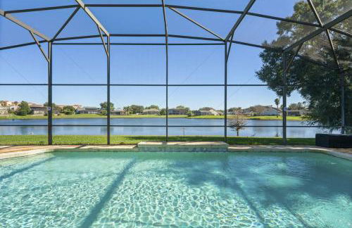 BRAND NEW! Lakefront 9BR Pool Hot Tub Outdoor Kitchen BBQ Theater 2 miles Disney - Foto 30