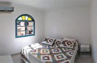 Casa com amplo quintal, churrasqueira e área verde - Foto 7