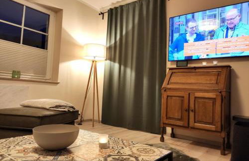 Ferienhaus Blaue Blume mit 11 kW Ladestation, Kamin, Terrasse, eingezäuntem Garten, Sauna, WLAN, Netflix, 2 Hunde willkommen! - Foto 12