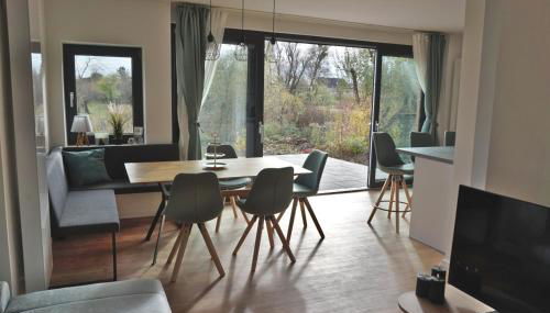 FeWo EG am Fluss mit Terrasse - eine grüne Oase - Foto 2