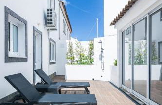 Modern 3BR Home, AC in All Rooms, Walk to 2 Beaches, Private Patio, Washer & Dryer - Photo 4