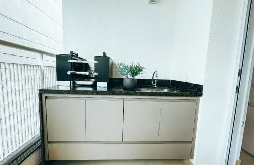 ACONCHEGANTE E MODERNO APARTAMENTO PERTÍSSIMO DA PRAIA - Foto 14
