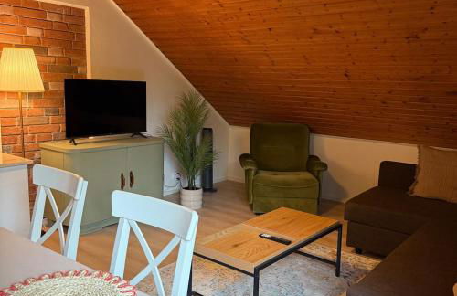 Holziges Dachgeschoss-Apartment - Foto 5