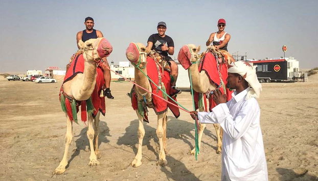 Doha Safari Camel Ride & Sandboarding - Photo 3, Enjoying the camel ride