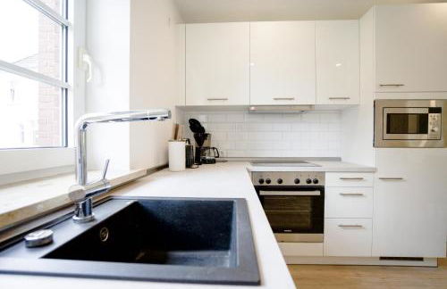 Sonnenterrasse - Helle & moderne Ferienwohnung am Meer - Foto 9