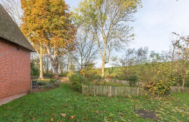 Reetgedecktes Ferienhaus mit Kachelofen - Foto 21