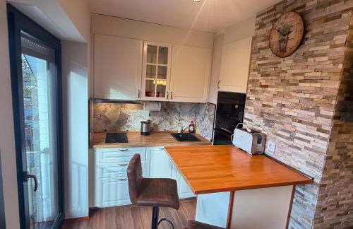 Einliegerwohnung in einer Traumvilla - Foto 4