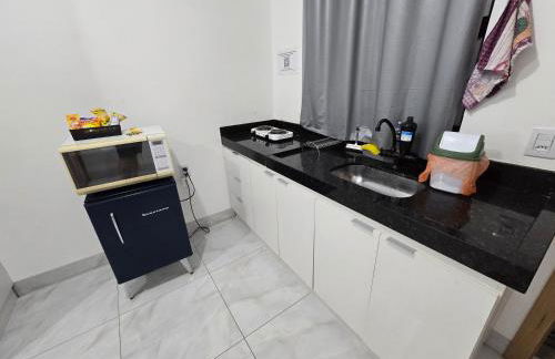 Flat completo a 5 minutos apé de mercado, farmácia - Foto 28