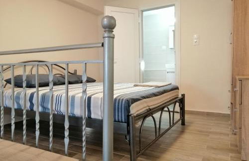 Marina's Apartments - White & Stone Apartment - Photo 21