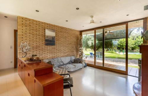 Can Noguer – Casa con piscina y jardín - Photo 10