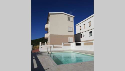 Trilocale vista mare con piscina a Badesi - Foto 1