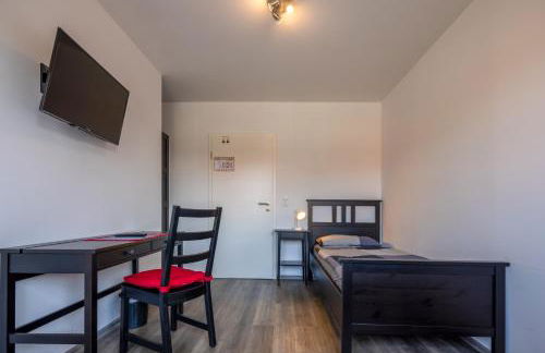 Gästehaus Olympia Wilhelmshaven - Moderne Einzelzimmer mit eigenem Bad für Monteure - Foto 3