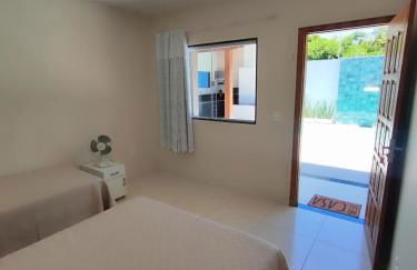 ESPAÇO PÉROLA GUANABARA, 70 Metros do Mar, 4 Suítes independentes COM AR, Área Gourmet Integrada com Piscina,Churrasqueira, 900 Metros de CASTELHANOS, ideal para FAMÍLIAS E AMIGOS - Foto 32