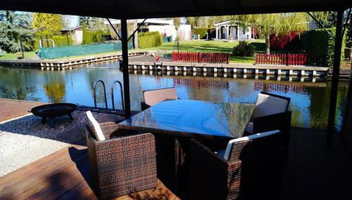 Ferienhäuschen direkt am Wasser inklusive 2 Boote - Foto 3, Garden