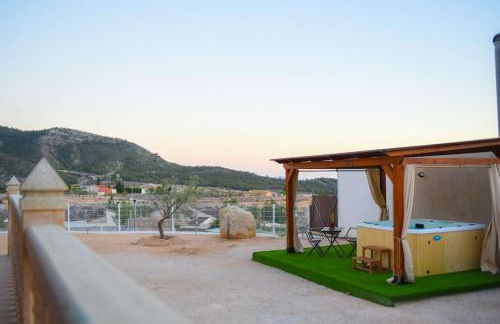 La casica de madera con Jacuzzi exterior y barbacoa - Foto 31