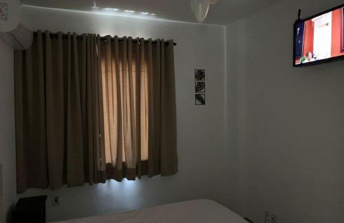 Apartamento Praia das Astúrias, 2 minutos de caminhada para praia, piscina, garagem demarcada, cama Queen - Foto 30