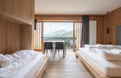 Ama Dolomiti - Residence - Photo 43