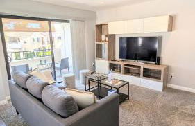 Poolside 2BR Condo with Balcony & Workspace - Photo 14