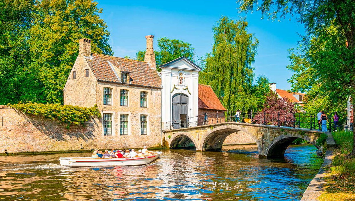 Enjoying a boat ride through Bruges