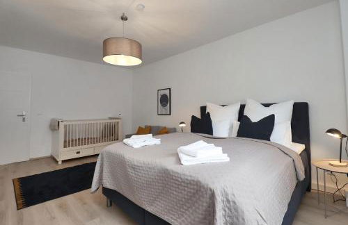 Design am Rhein I Traumlage Rheinufer I 3BR I Küche I öffentl Parkplätze I helloYOU apartments x BRIGHT Collection - Foto 7