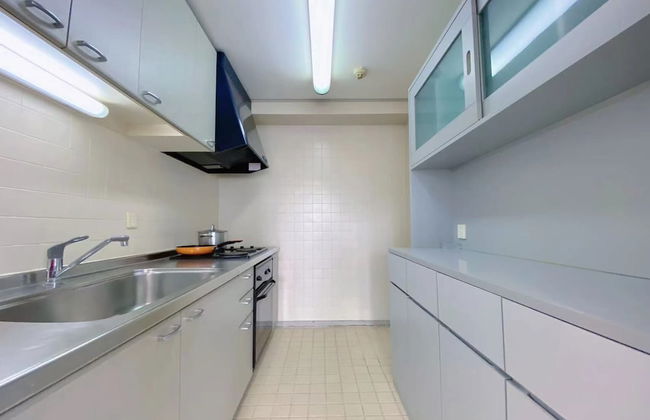 Beijing Jiuxian Apartment - Foto 9