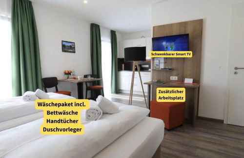 Holledau-Apartments - FeWo bis 5 Pers - getrennte Betten möglich - Vollausstattung - 24h Checkin - wöchentl Reinigung u Wäschewechsel - Waschmaschine u Trockner - WLAN - Minibar - XXL Parkplätze - Garten - ruhige Lage - Foto 13