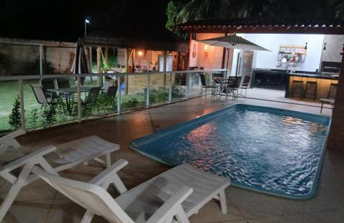 Linda casa com piscina, quiosque e churrasqueira a 150 metros da praia - Foto 5